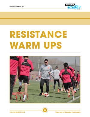 A soccer coach oversees players in red using resistance bands for warm-ups, inspired by SoccerTutor’s Warm Ups to Maximise Performance: 50 Practices – ideal for youth to pro football periodization and training weeks.