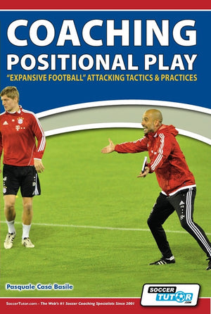 A soccer coach instructs on the field as a player in red listens. SoccerTutors Coaching Positional Play – Expansive Football Attacking Tactics & Practices guides coaches on advanced attacking strategies and positional play techniques.