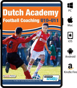 Two young boys play soccer; one in red tackles the ball from another in an Ajax kit. This image is the cover of "Dutch Academy Football Coaching U10-11 - Technical and Positional Practices from Top Dutch Coaches" by SoccerTutor.